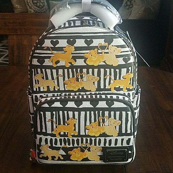Loungefly Handbags - *NEW* Simba & Nala mini backpack